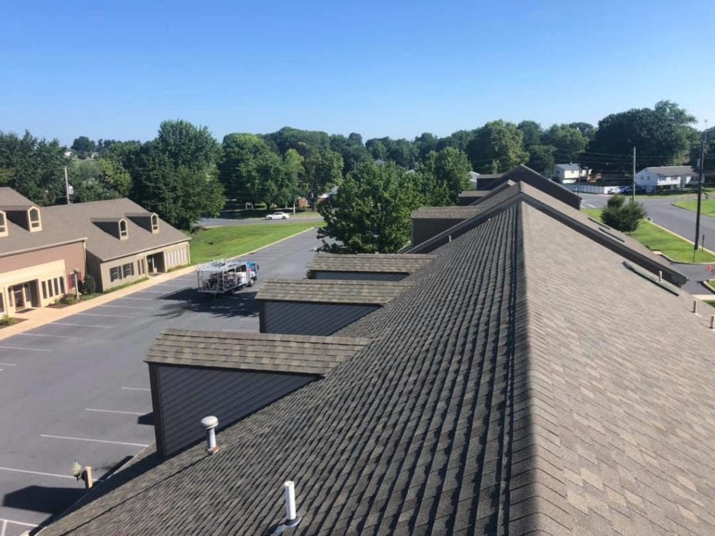 Liberty SoftWash can rid you of your ugly roof problem in Pennsylvania, Maryland and Delaware. The process we use when cleaning all types of roofing materials including asphalt shingles, slate tiles, cedar shake, metal and tile roofs, is called softwashing. The softwash process utilizes a low-pressure cleaning solution application which will remove the black streaks, algae, lichen and moss from your roof.